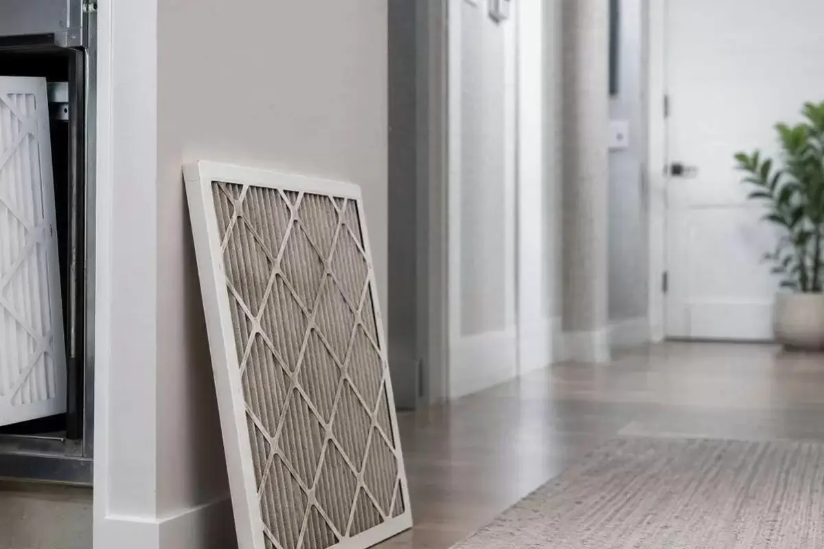 Central AC Repair Cost San Bruno CA — replacing a central AC air filter