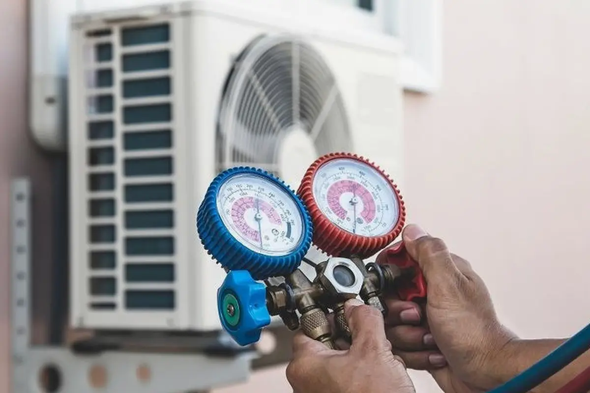 AC Blower Motor & Fan Repair in Capuchino San Bruno CA — refrigerant gauges during AC service