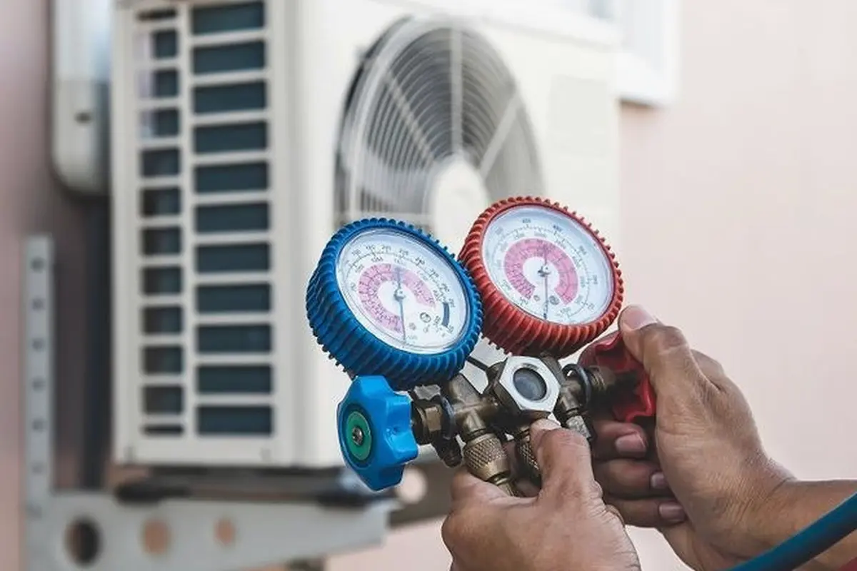 AC Blower Motor & Fan Repair in Crestmoor San Bruno CA — refrigerant gauges during AC service