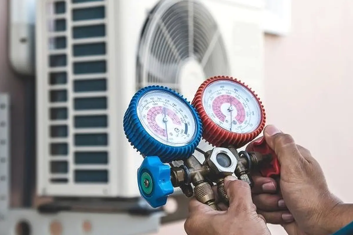 AC Blower Motor & Fan Repair in Lomita Park San Bruno CA — refrigerant gauges during AC service