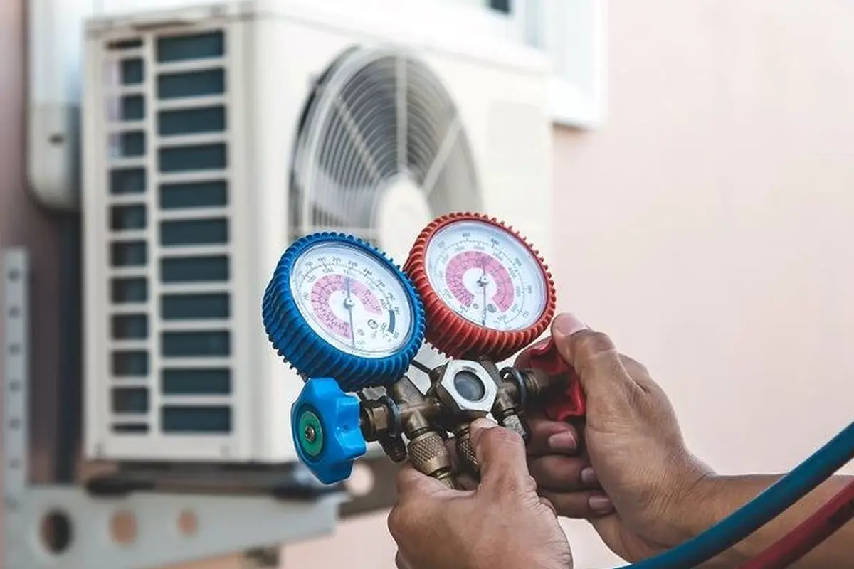 AC Blower Motor & Fan Repair in Mills Park San Bruno CA — refrigerant gauges during AC service