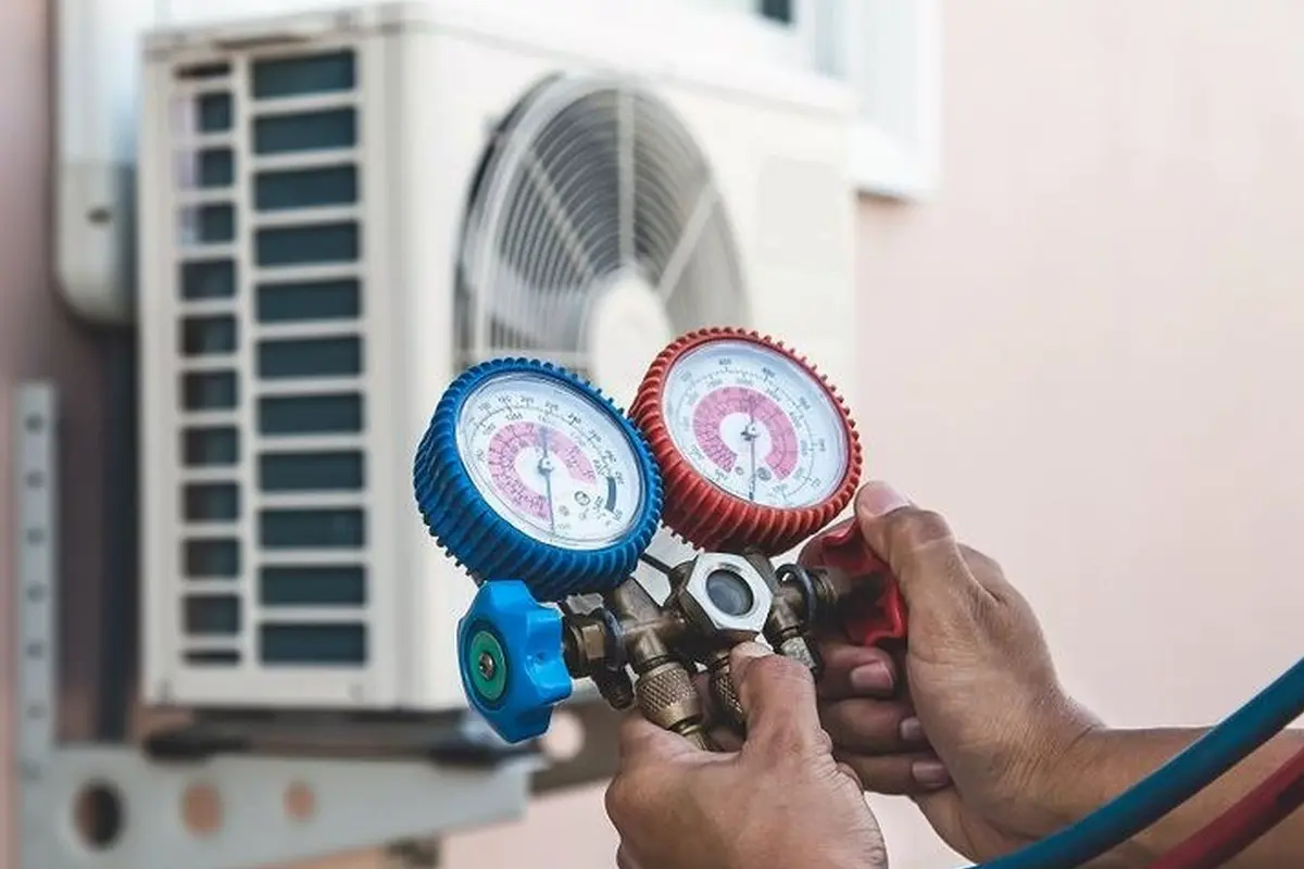 AC Compressor Repair & Replacement in Capuchino San Bruno CA — refrigerant gauges during AC service