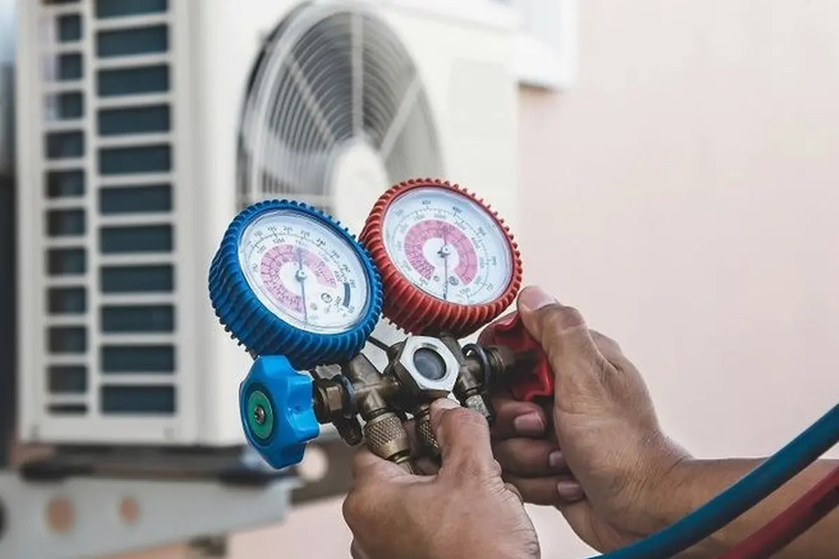AC Compressor Repair & Replacement in San Bruno Park San Bruno CA — refrigerant gauges during AC service