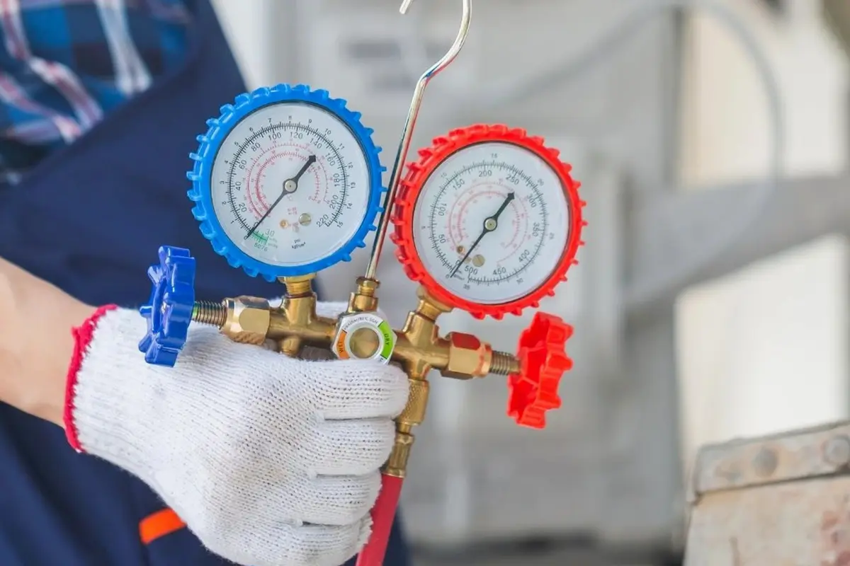 AC Refrigerant Leak Repair & Recharge in Mills Park San Bruno CA — refrigerant gauges during AC service