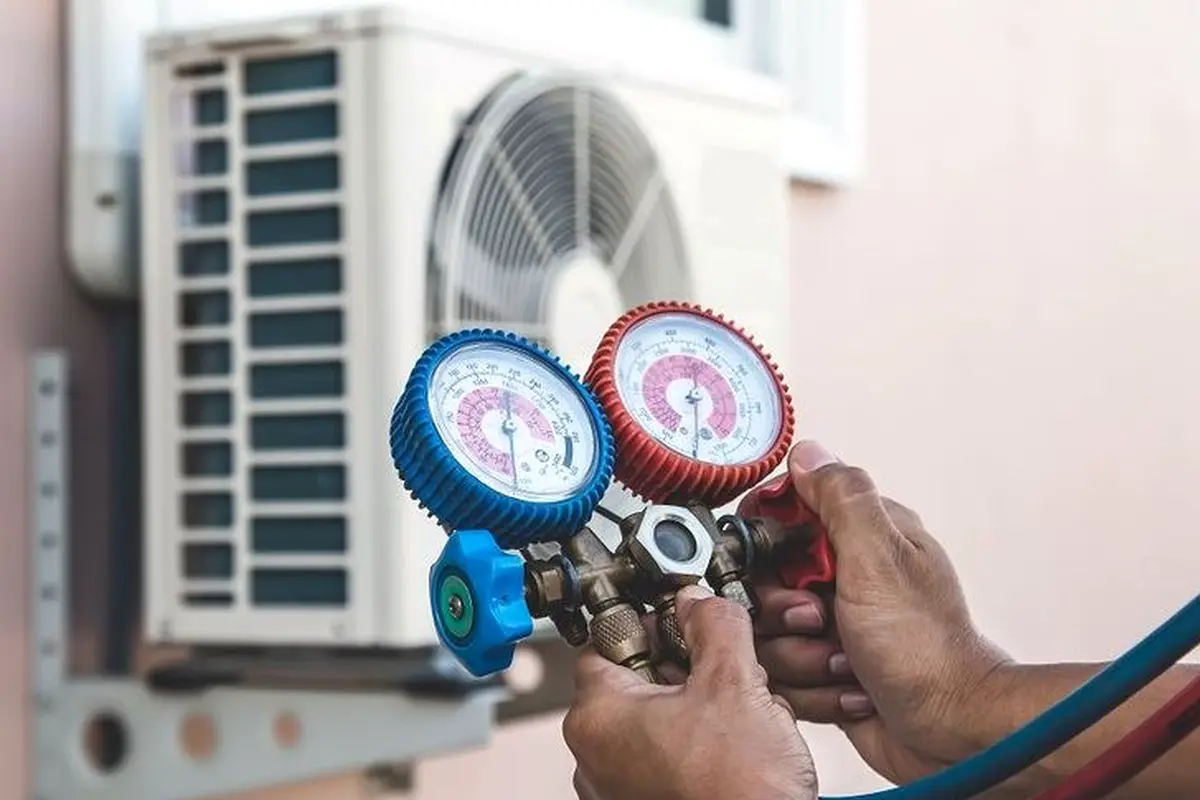 Central AC Maintenance & Tune-Up in Capuchino San Bruno CA — refrigerant gauges during AC service