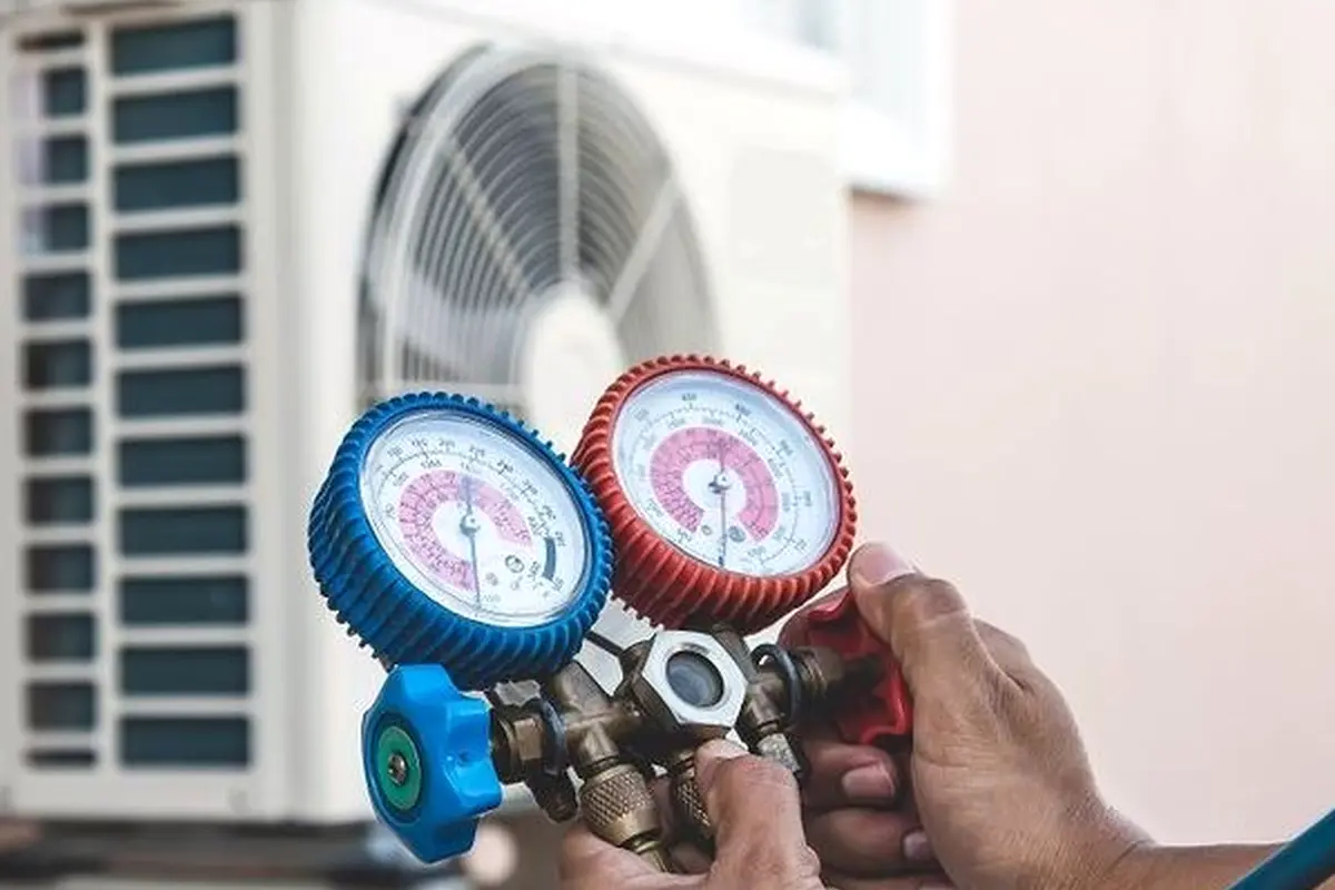 Central AC Maintenance & Tune-Up in Lomita Park San Bruno CA — refrigerant gauges during AC service