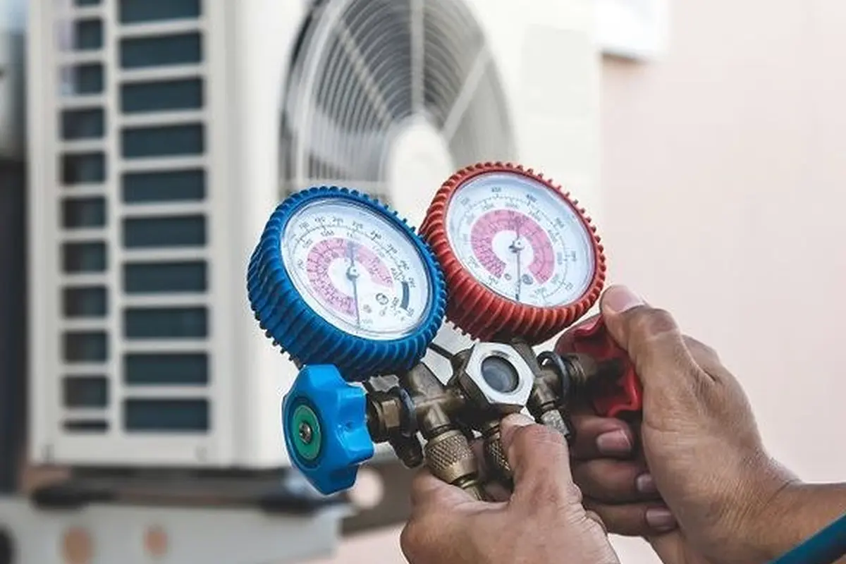Central AC Maintenance & Tune-Up in Mills Park San Bruno CA — refrigerant gauges during AC service