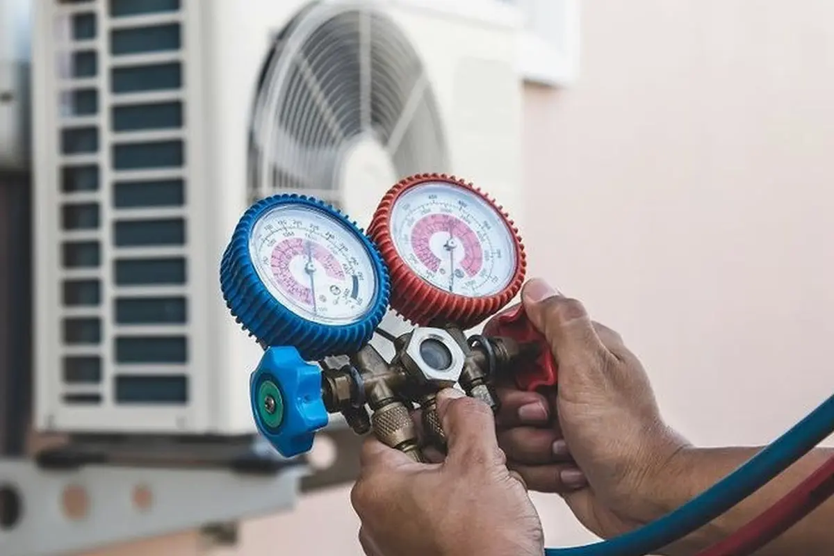 Central AC Maintenance & Tune-Up in Rollingwood San Bruno CA — refrigerant gauges during AC service