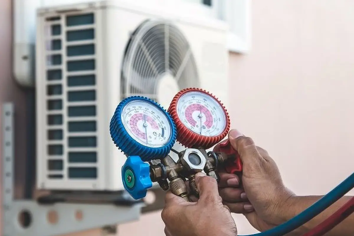 Central AC Maintenance & Tune-Up in San Bruno Park San Bruno CA — refrigerant gauges during AC service