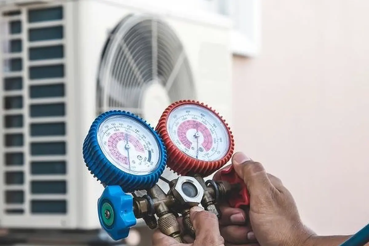 Emergency Central AC Repair in Belle Air Park San Bruno CA — refrigerant gauges during AC service