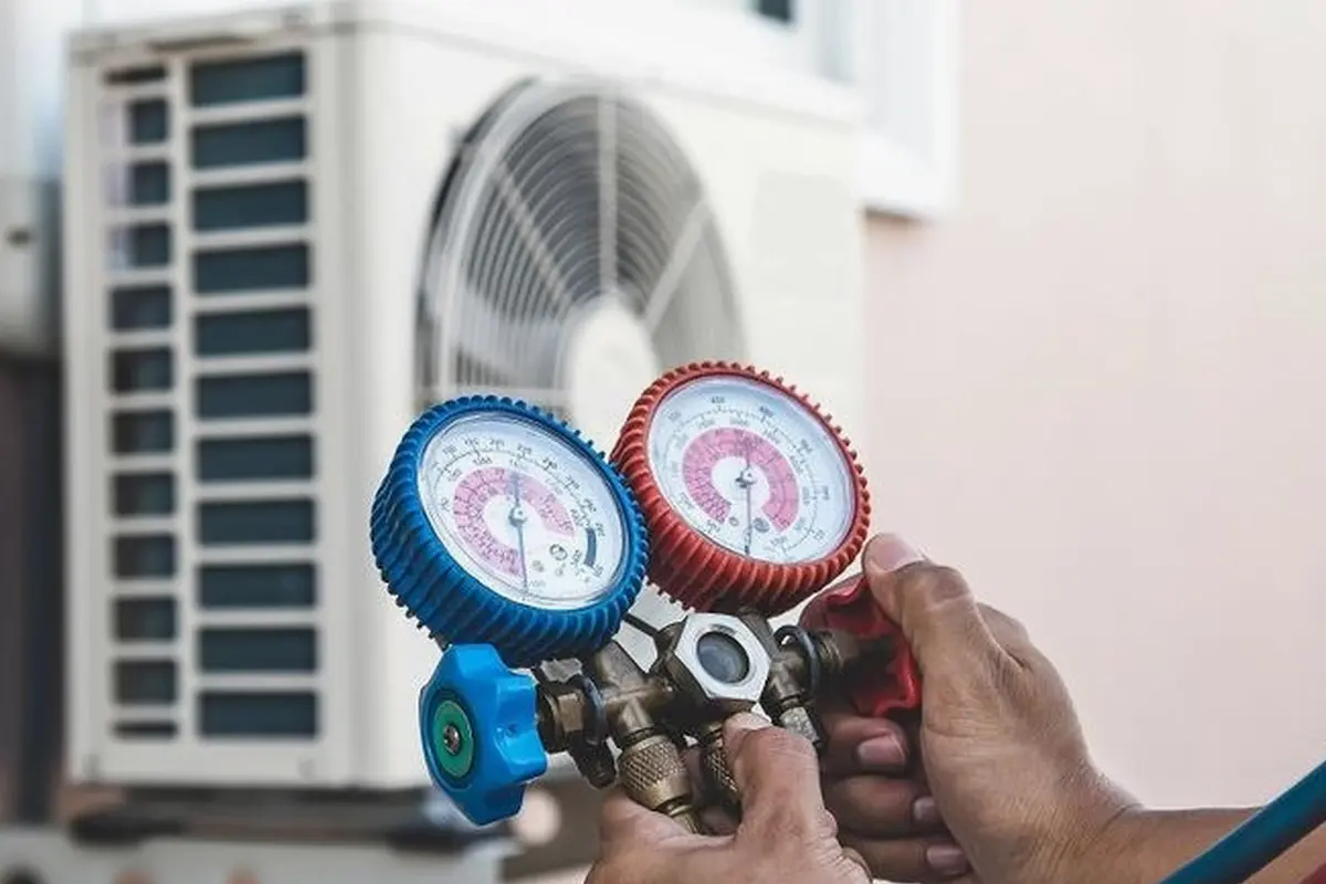Emergency Central AC Repair in Mills Park San Bruno CA — refrigerant gauges during AC service