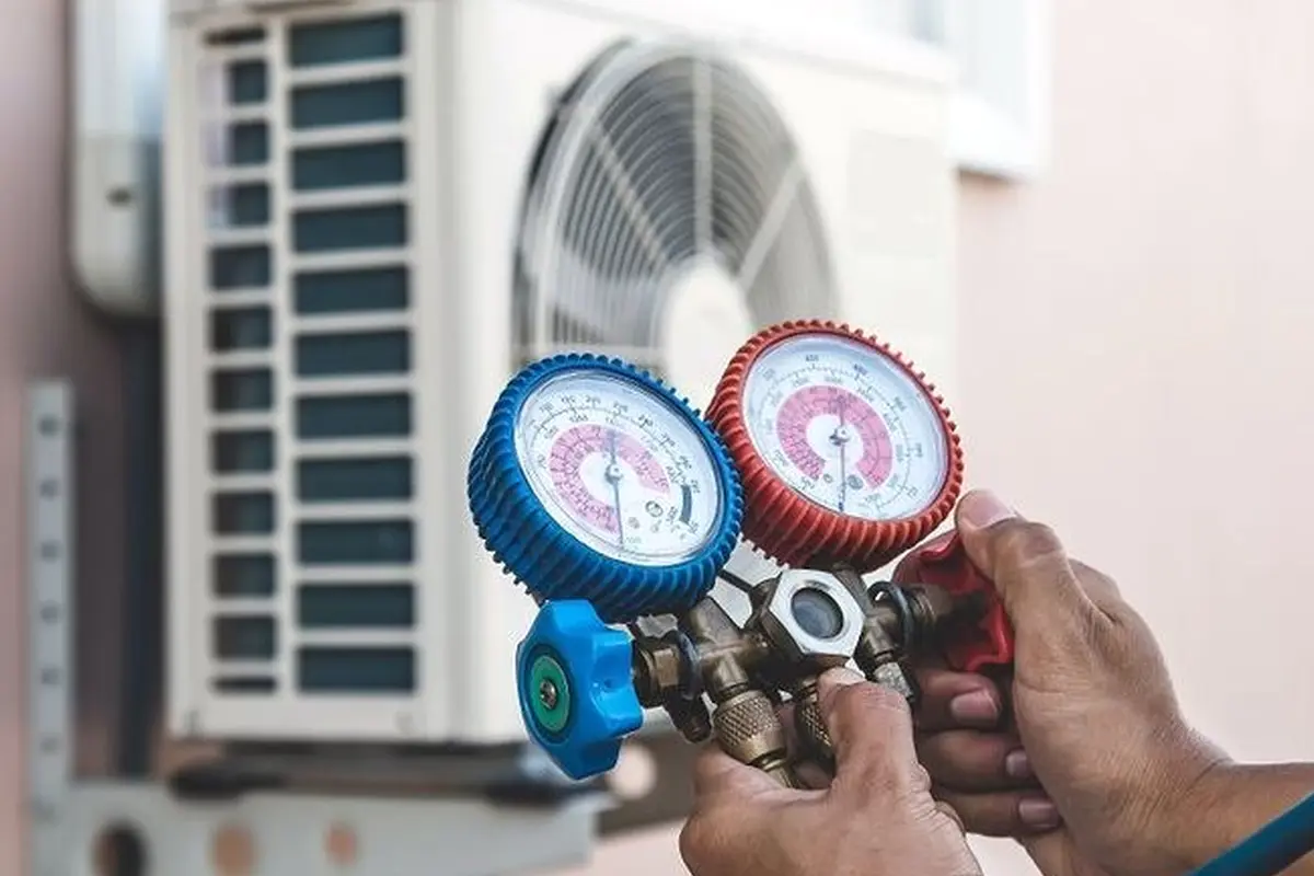 Emergency Central AC Repair in Portola Highlands San Bruno CA — refrigerant gauges during AC service
