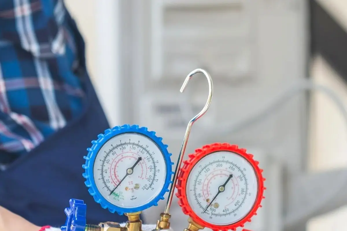 Emergency Central AC Repair in Rollingwood San Bruno CA — refrigerant gauges during AC service