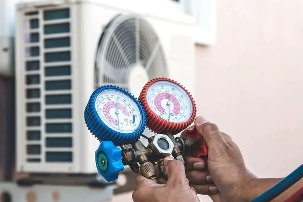 Emergency Central AC Repair in San Bruno Park San Bruno CA — refrigerant gauges during AC service