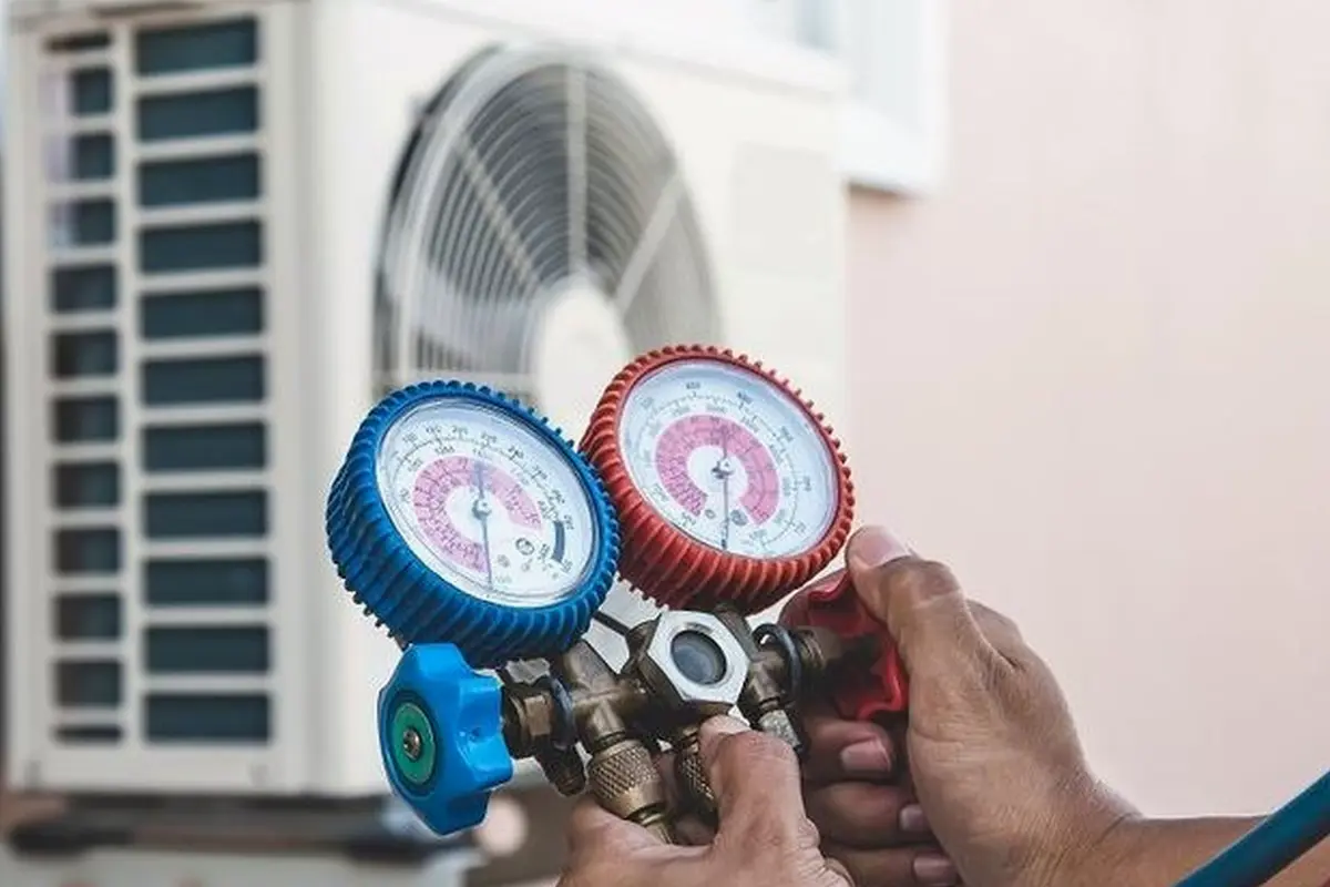 Thermostat Repair & Replacement in Mills Park San Bruno CA — refrigerant gauges during AC service