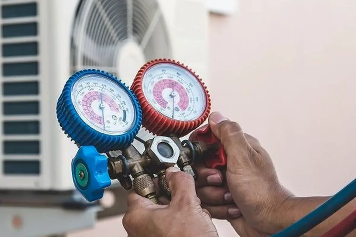Thermostat Repair & Replacement in Portola Highlands San Bruno CA — refrigerant gauges during AC service